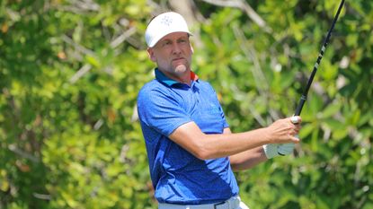 Ian Poulter hits a drive at the LIV Mayakoba event