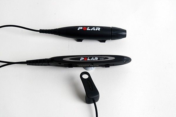 The chainstay sensor (middle) monitors chain tension and cadence while the derailleur sensor (bottom) measures chain speed. The battery unit (top) attaches to the seatstay