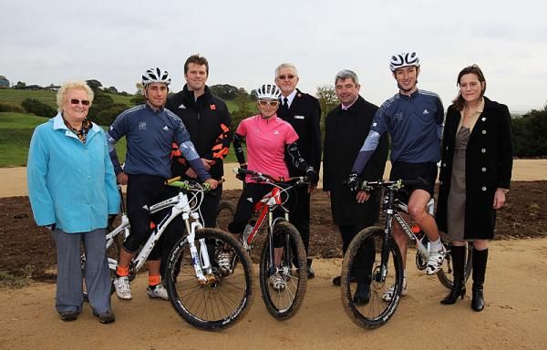 Cllr Pam Challis, Billy-Joe Whenman, David Luckes (LOCOG), Maddie Horton, Major John Warner, Cllr Steven Castle, Paul Beales and Rebecca Harris (MP) pictured the London 2012 Olympic Mountain Bike venue at Hadleigh Farm
