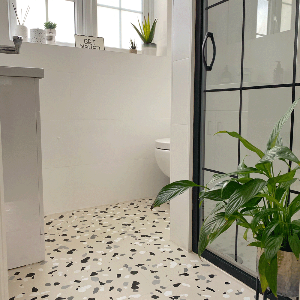 bathroom with terrazzo tile and potted plant
