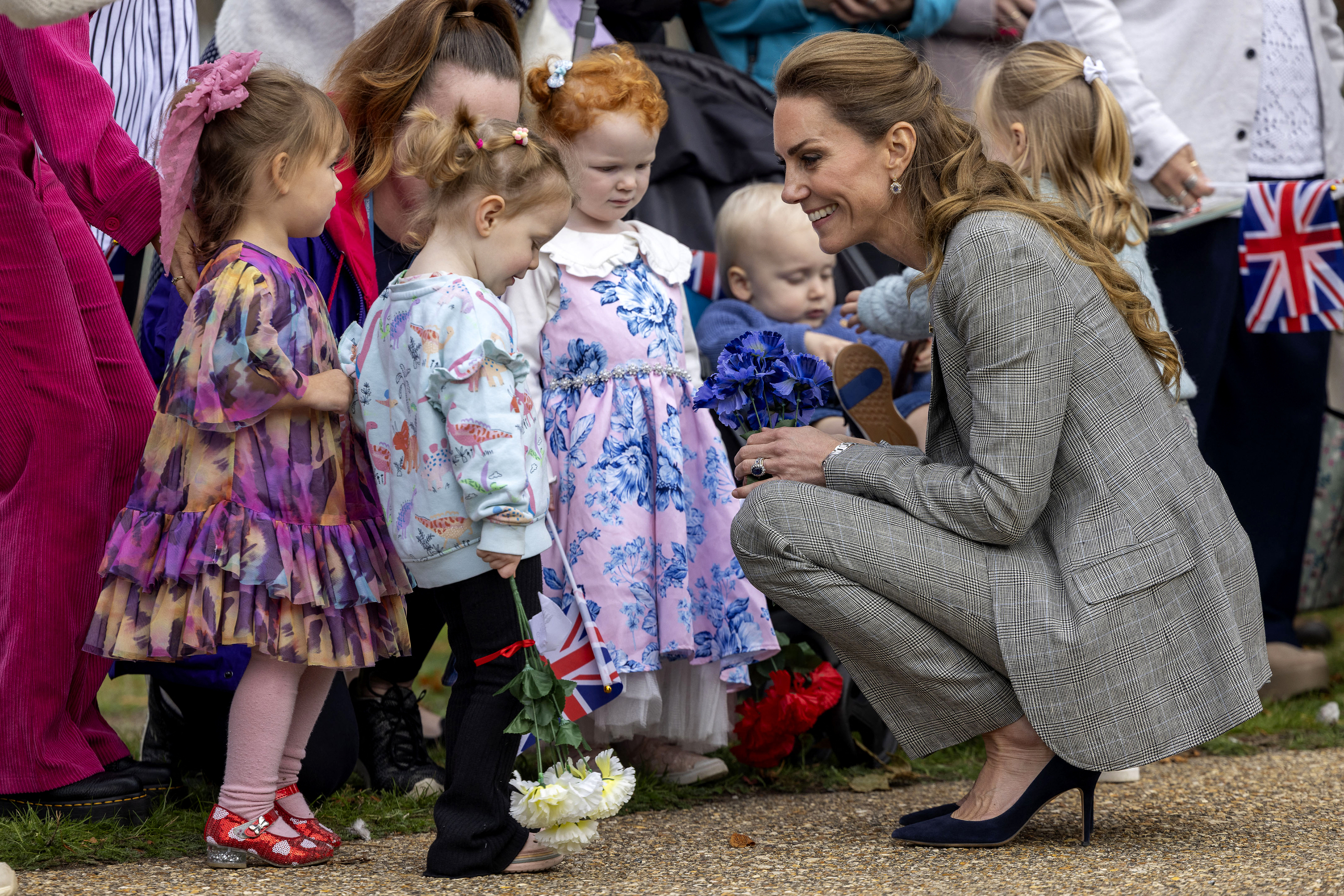 Britain&#039;s Catherine, Princess of Wales meets children during a visit to RAF Coningsby in Lincolnshire, eastern England, on October 2, 2025. (Photo by James Glossop / POOL / AFP) (Photo by JAMES GLOSSOP/POOL/AFP via Getty Images)