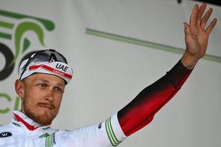 Italys Matteo Trentin of UAE Team Emirates celebrates his victory on the podium of the Grand Prix du Samyn