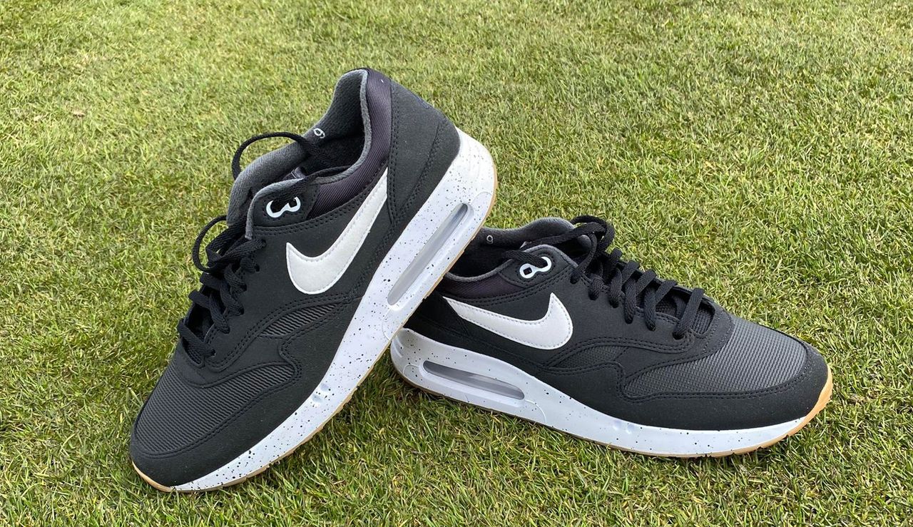 The Nike Air Max 1 &#039;86 OG G Golf Shoe on a green background