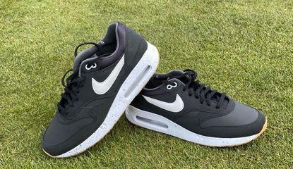 The Nike Air Max 1 '86 OG G Golf Shoe on a green background