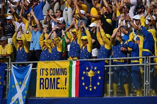 Ryder Cup fans with banner saying It's Coming Rome