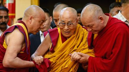 The Dalai Lama arrives to a prayer ceremony in Dharamsala, India, on June 4, 2025.