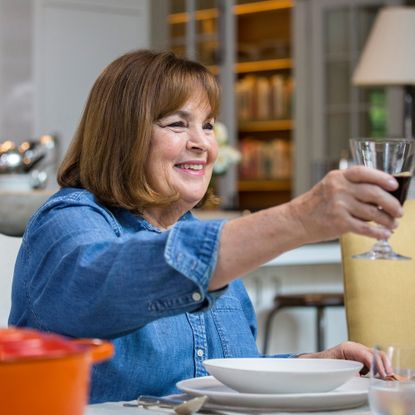 Ina Garten raising a glass of wine