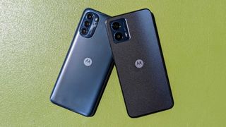 Moto G 5G 2023 and 2022 on a green surface