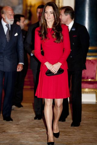 Kate Middleton repeats her red Alexander McQueen dress.