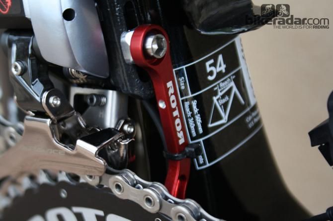 The mechanic&rsquo;s neat handiwork to hide cabling to the Rotor chain catcher sits alongside the frame&rsquo;s vital statistics; note stack and reach measurements sitting alongside more traditional frame centimetre size