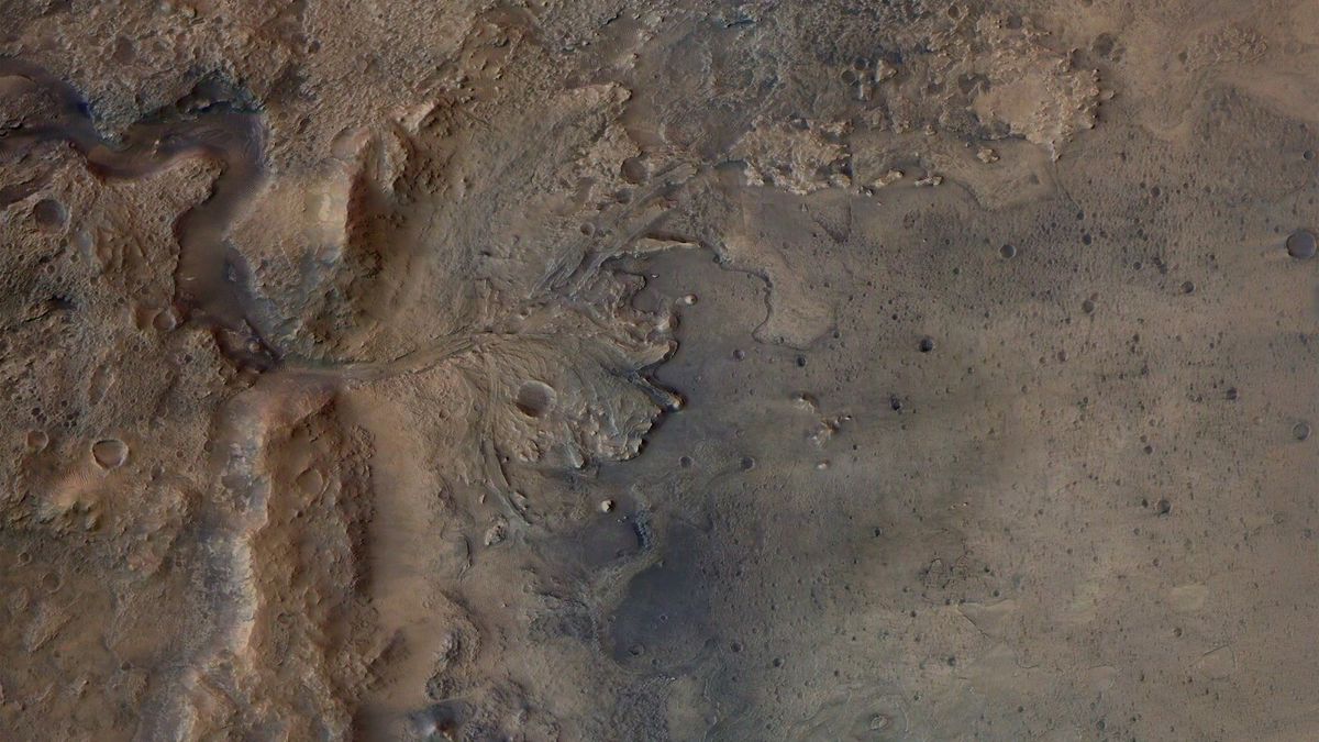 This image shows the remains of an ancient delta in Jezero Crater, which NASA's Perseverance Mars rover will explore for signs of fossilized microbial life. The image was taken by the High Resolution Stereo Camera on ESA's Mars Express orbiter.