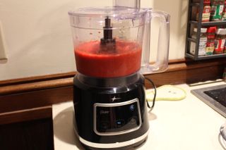 A finished fruit puree in the Oster 10-Cup Food Processor with Easy-Touch