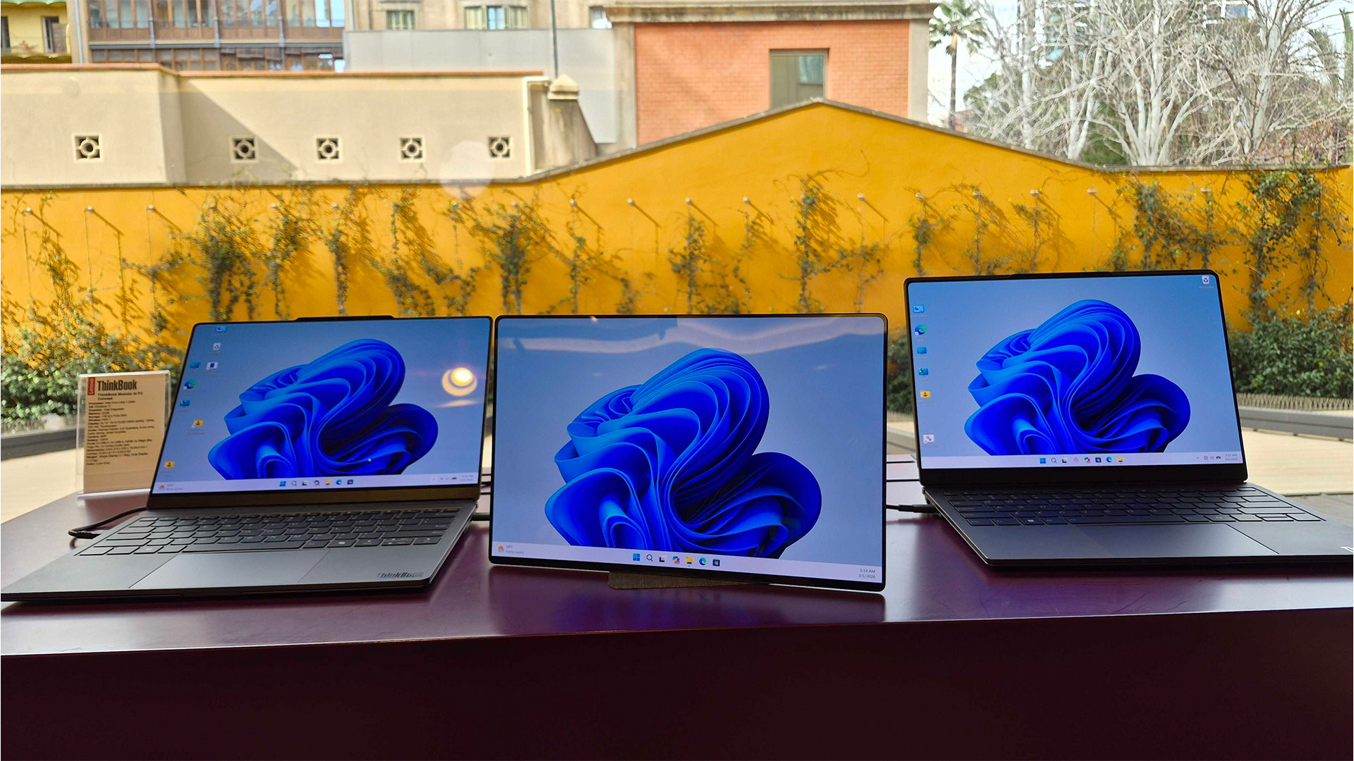 The Lenovo ThinkBook Modular AI PC pictured in different formats at MWC 2026 in Barcelona, Spain.