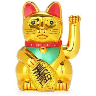 A gold, red and green Maneki Neko with raised paw