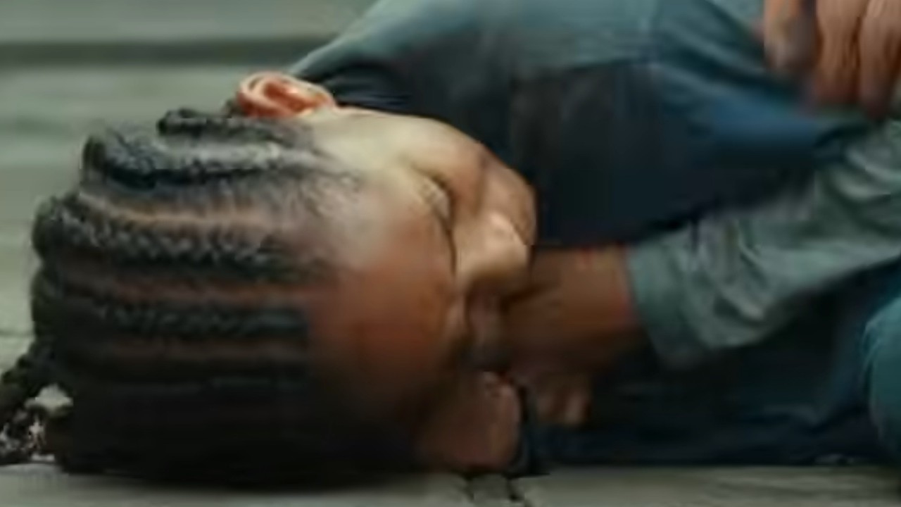 Jaden Smith writhing in pain in The Karate Kid
