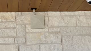 An RF Venue Diversity Architectural antenna blending into a stone wall.