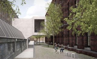 Courtyard area between two old buildings joined by a new concrete bridge with large viewing window.