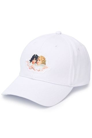 white baseball cap with cherubs on it