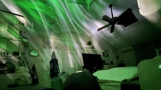 Govee star light projector displays green aurora