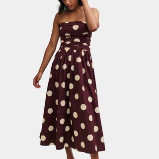 woman wearing brown polka dot dress