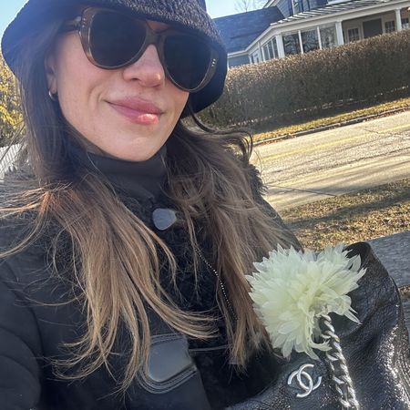 Julia Gall wearing a floral brooch inspired by the Chanel Spring 2026 runway