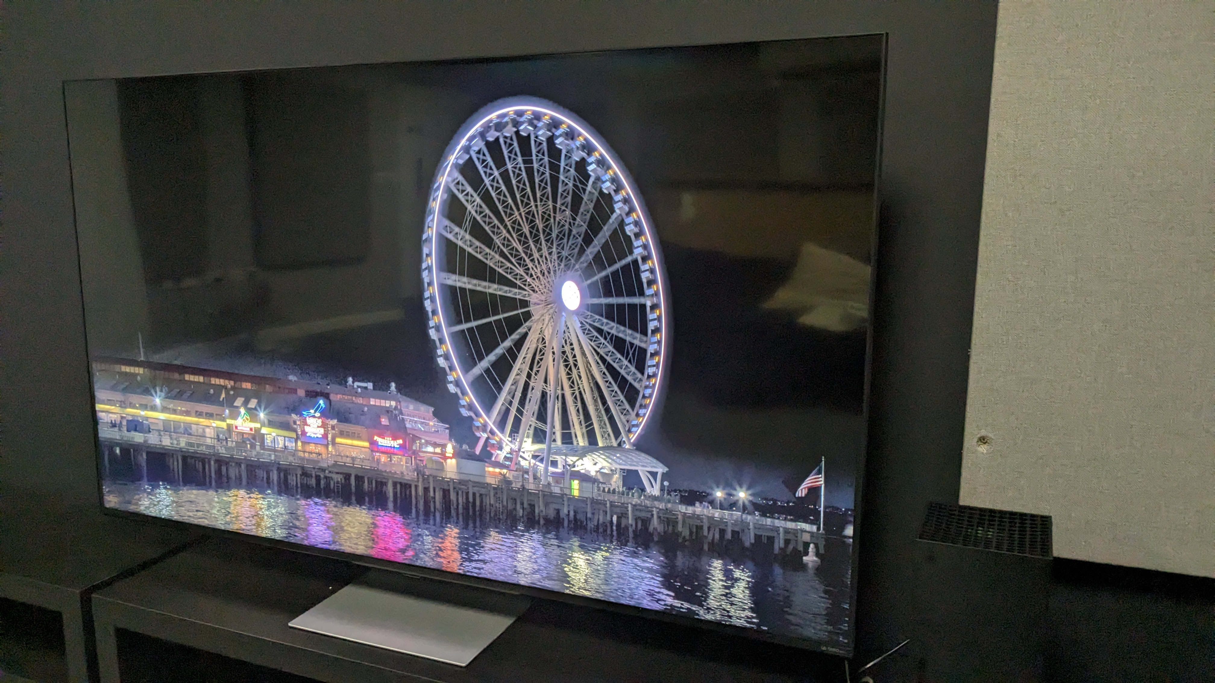 LG QNED91T with ferries wheel on screen