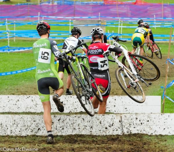 Racers run over the second set of barriers