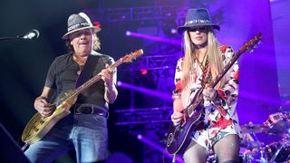 Carlos Santana (L) and special guest Orianthi perform in concert at Dos Equis Pavilion on May 06, 2023 in Dallas, Texas.