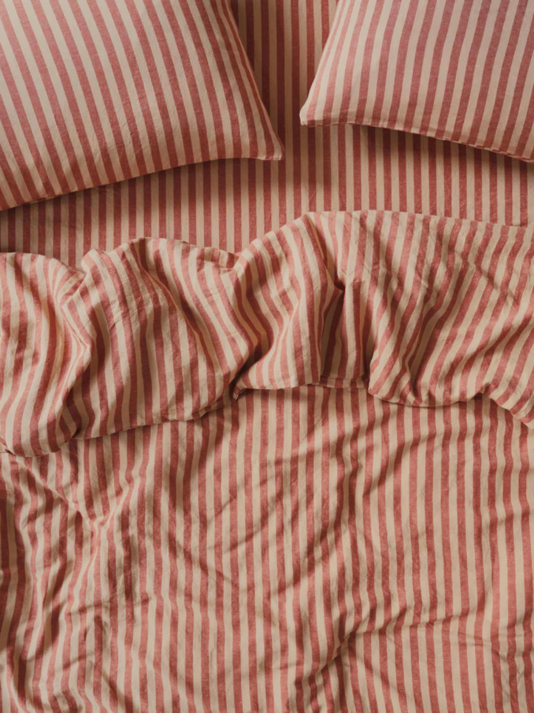 A striped sandstone bedding set from Piglet in Bed
