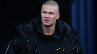 MANCHESTER, ENGLAND - JANUARY 07: Erling Haaland of Manchester City looks on during the Emirates FA Cup Third Round match between Manchester City and Huddersfield Town at Etihad Stadium on January 07, 2024 in Manchester, England. (Photo by James Gill - Danehouse/Getty Images)