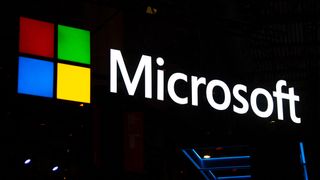 Microsoft logo sits illumintated outside the Microsoft booth on day 2 of the GSMA Mobile World Congress 2019 on February 26, 2019 in Barcelona, Spain