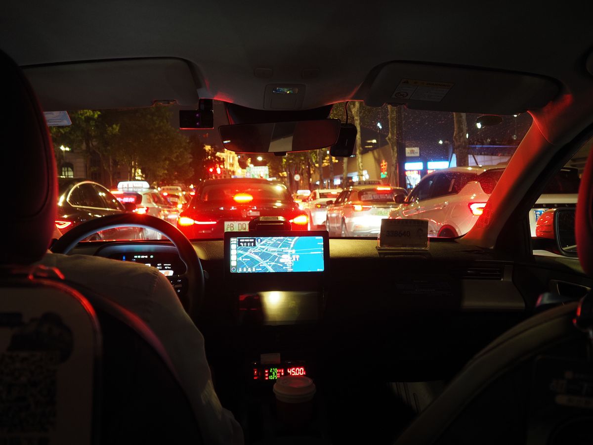 OM System PEN sample gallery: Inside a taxi in Shanghai, China, at night