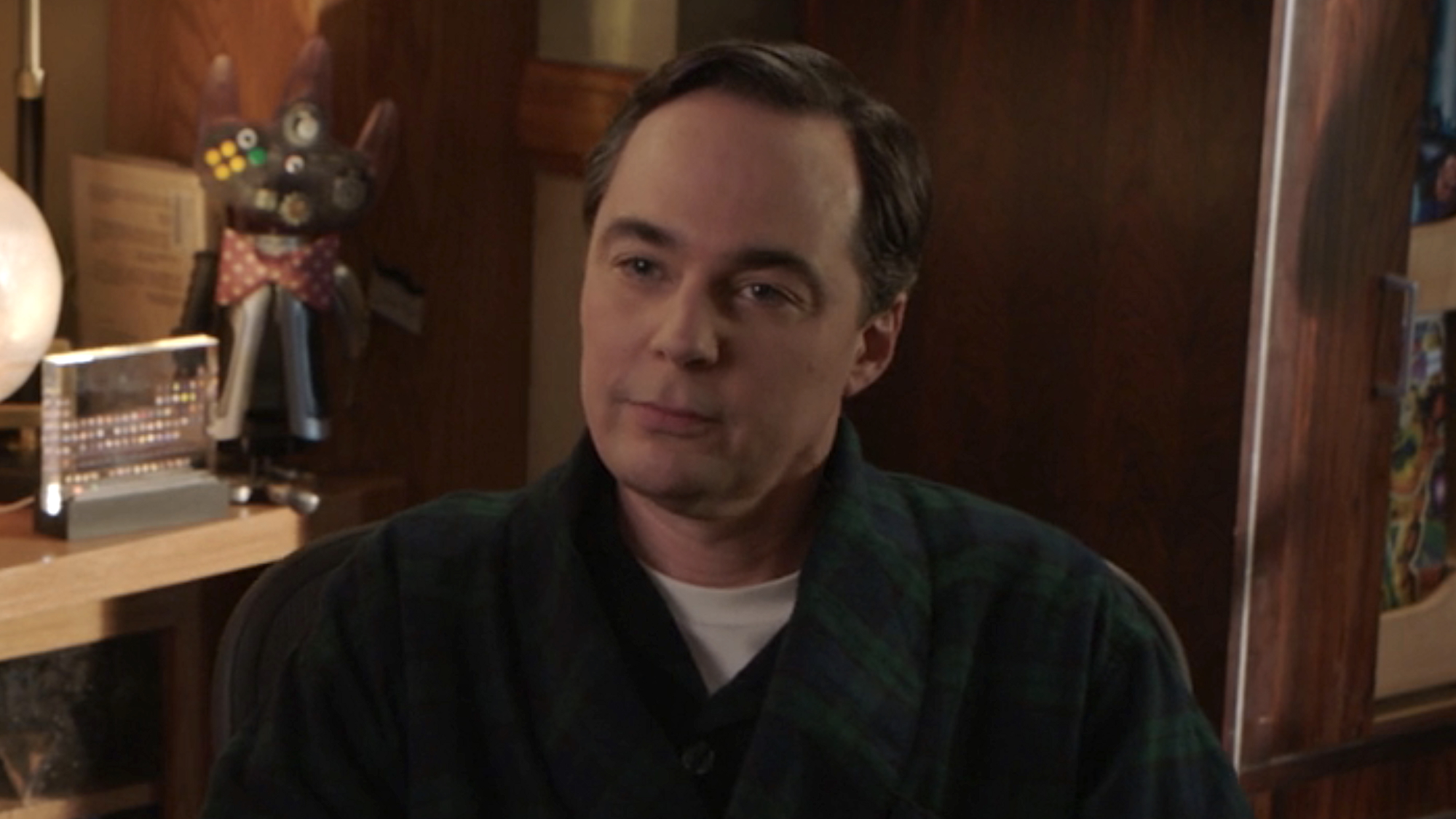 Sheldon sitting in office spatting with Amy in Young Sheldon series finale