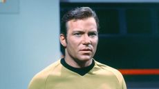 william shatner on a blue background