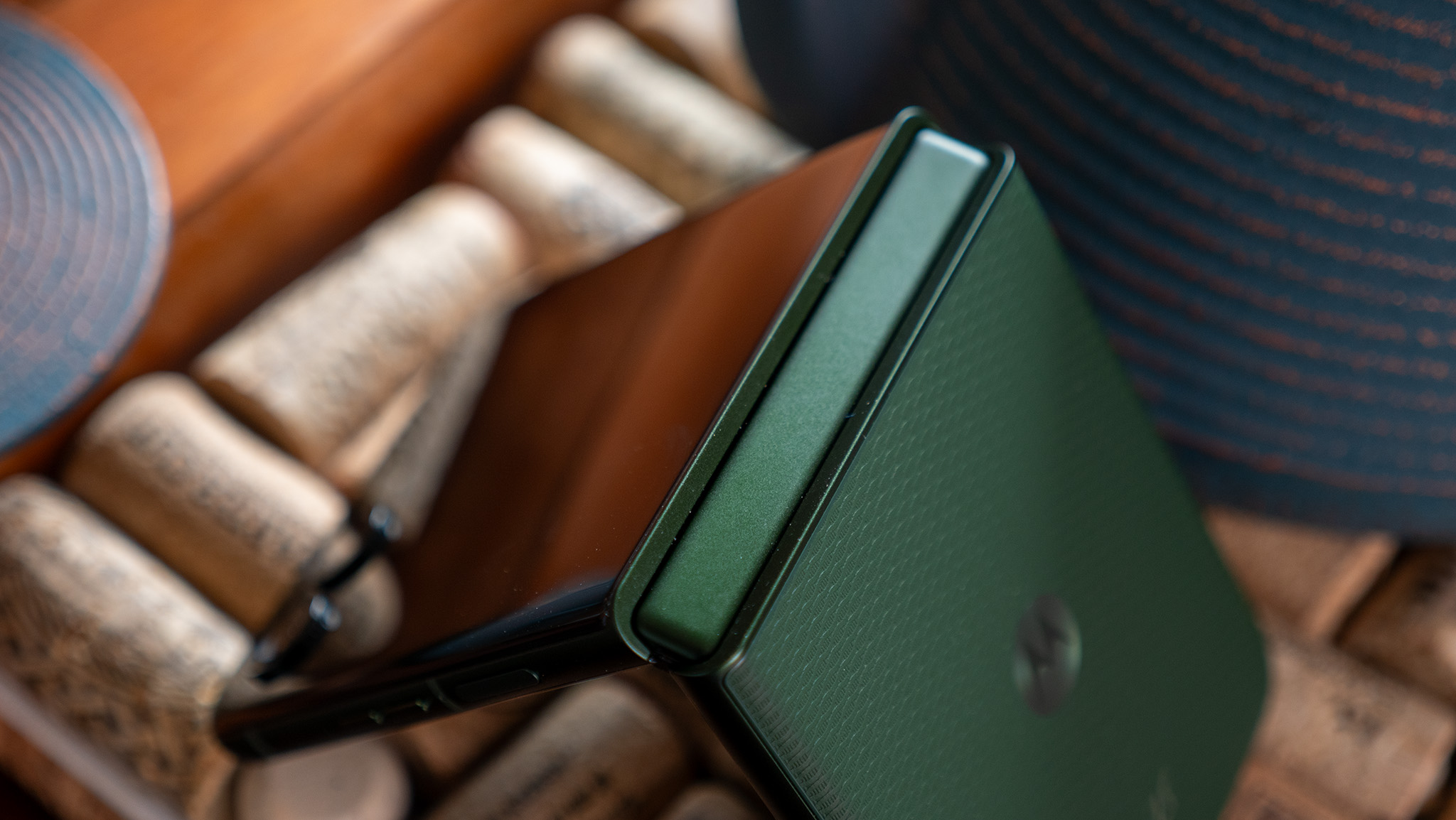 The titanium hinge of the green Motorola Razr Plus 2026