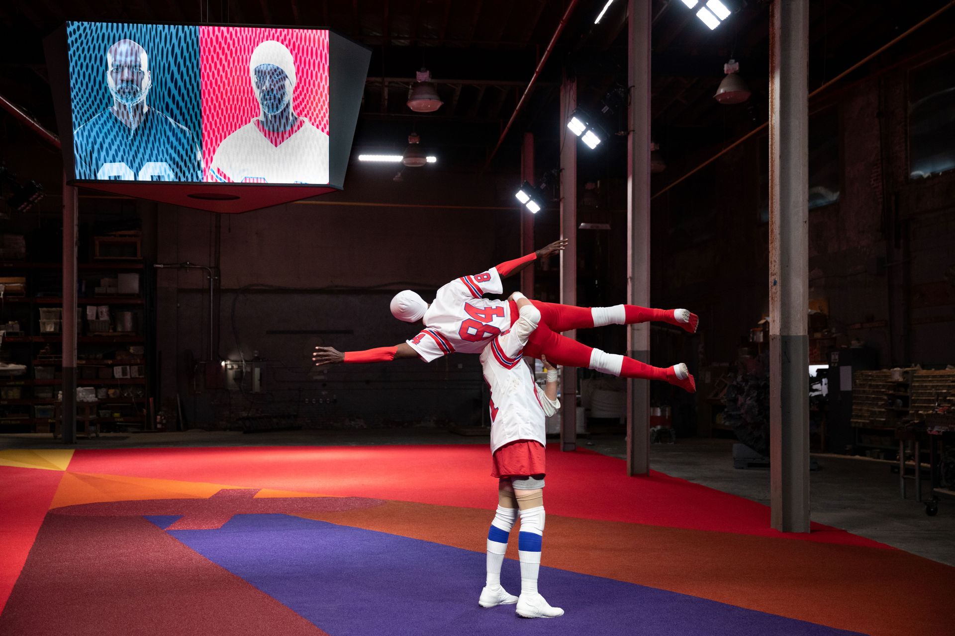 American footballers in performance art piece