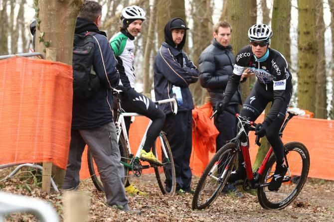 New Zealand's Alexander Revell looks on as Zdenek Stybar (Czech Republic) rides the Hoogerheide parcours