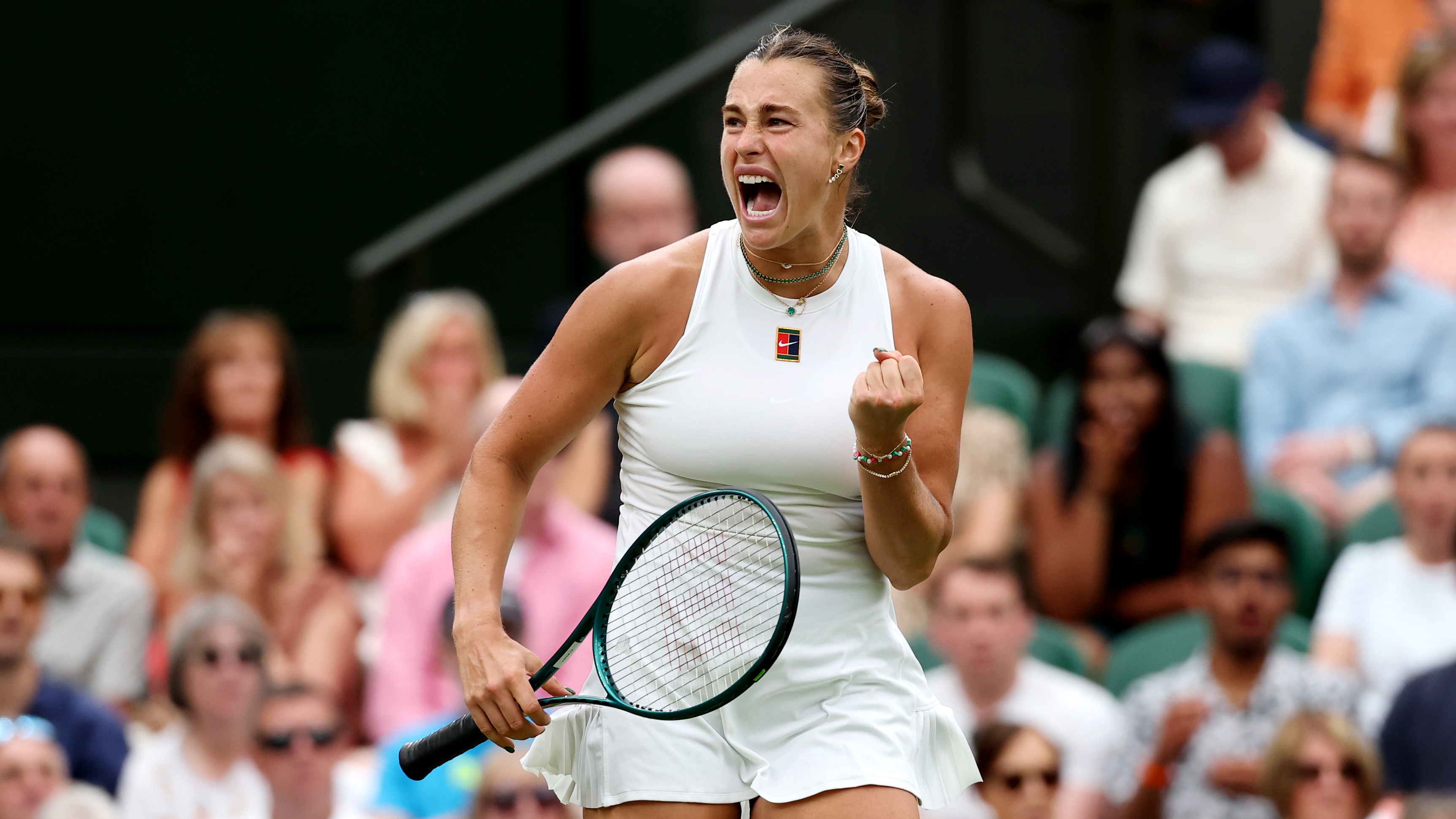 Aryna Sabalenka celebrates beating Elise Mertens at Wimbledon 2025