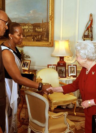 Queen Elizabeth with the President of Rwanda and his wife