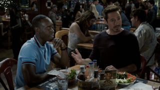 James Rhodes (Don Cheadle) and Tony Stark (Robert Downey Jr.) have lunch in Iron Man 3