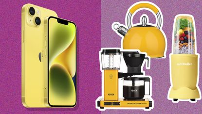 Apple iphone 14 in yellow with assortment of small kitchen appliances (coffee maker, kettle and blender)