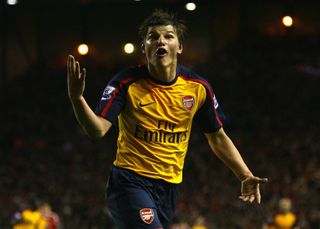 Arsenal's Andrey Arshavin celebrates after scoring his fourth goal in a 4-4 draw against Liverpool at Anfield in April 2009.