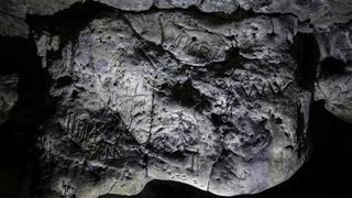 A cave at Creswell Crags in the U.K. contained hundreds of marks upon its walls, carved to ward off evil.