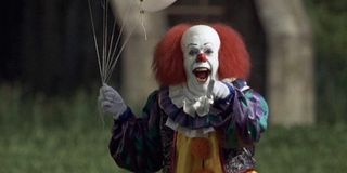 Tim Curry as Pennywise in It