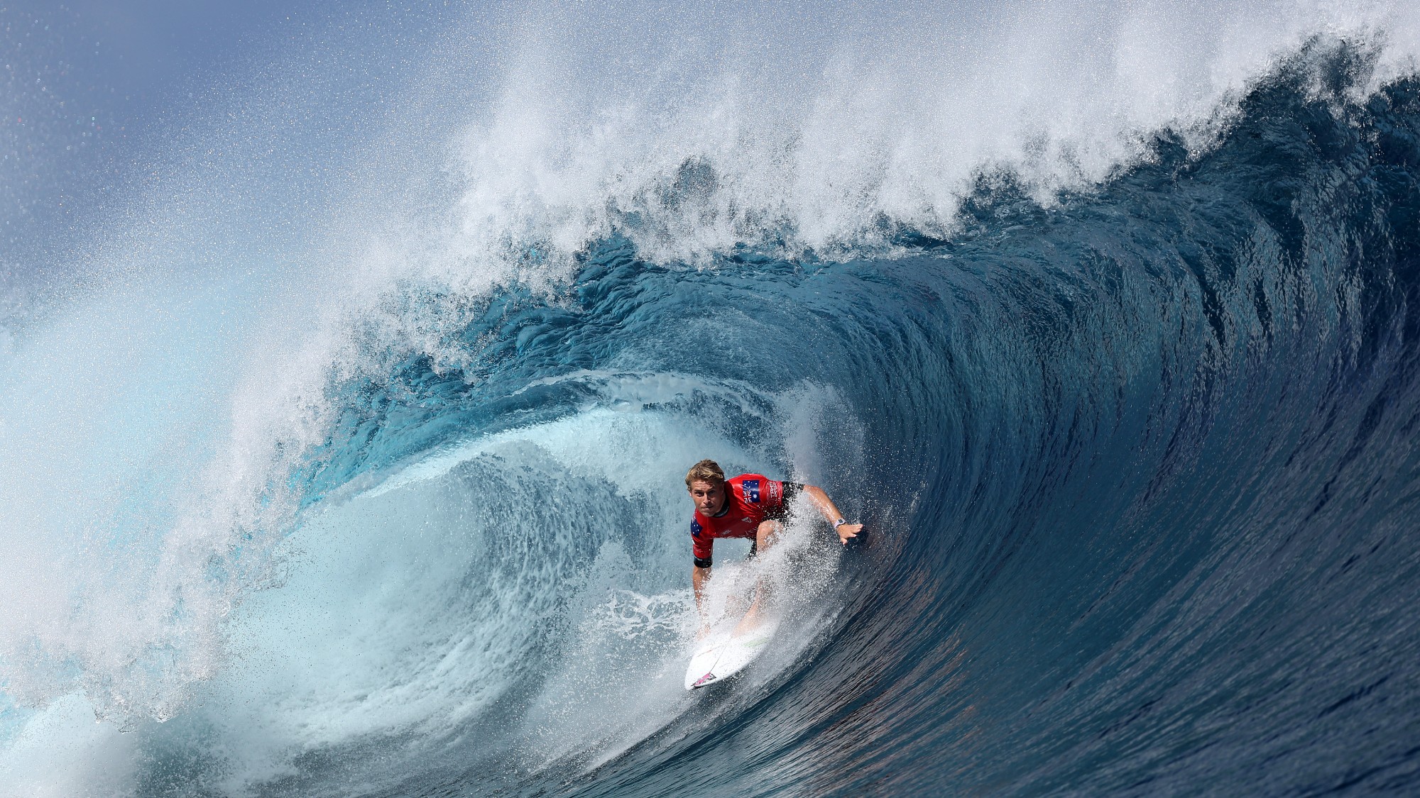 Australian surfer Ethan Ewing catches a wave at Teahupo'o in Tahiti