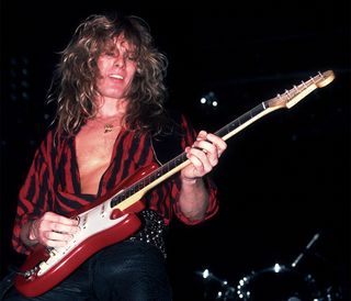 English Rock musician John Sykes, of the group Whitesnake, performs onstage at the Reunion Arena, Dallas, Texas, October 21, 1984.