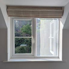 A DIY mosquito screen made with Velcro tape and fly mesh cut to size