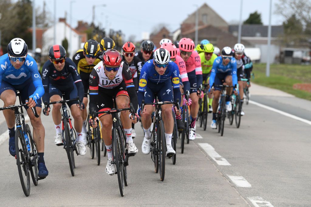 WEVELGEM BELGIUM MARCH 28 Matteo Trentin of Italy and UAE Team Emirates Sam Bennett of Ireland and Team Deceuninck QuickStep during the 83rd GentWevelgem in Flanders Fields 2021 Mens Elite a 254km race from Ypres to Wevelgem Breakaway GWE21 GWEmen FlandersClassic on March 28 2021 in Wevelgem Belgium Photo by Tim de WaeleGetty Images