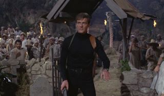 Live and Let Die Roger Moore surrounded by villagers