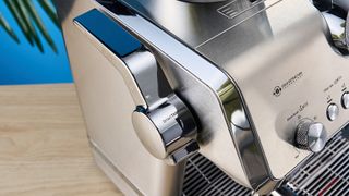 De'Longhi La Specialista Opera is a stainless steel manual espresso machine with smart tamping, a group handle, steam wand, and grinder